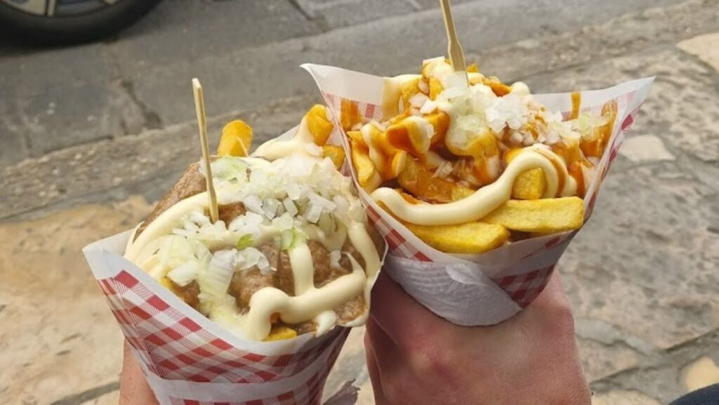 two big portions of fries and sauce from frida fries in san cristobal de las casas