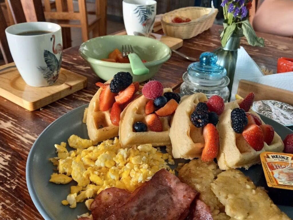 plate of waffles and eggs from la tertulia in san cristobal de las casas