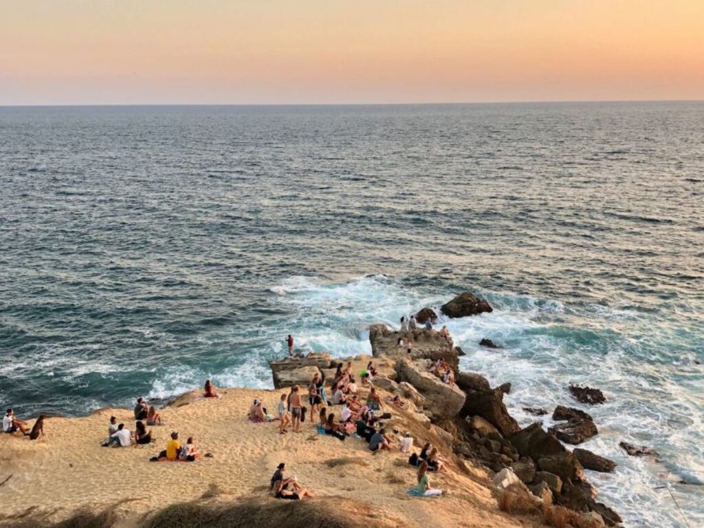 las tortugas viewpoint full with people at sunset in puerto escondido, mexico