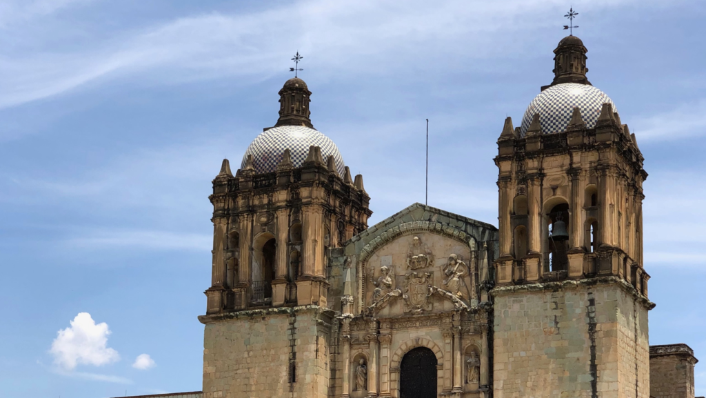 upclose shot of templo de Santo Domingo de Guzmán in Oaxaca, blue skies