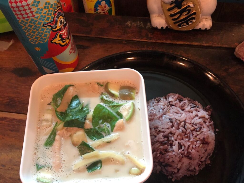 green curry and rice from thai food truck pai walking street