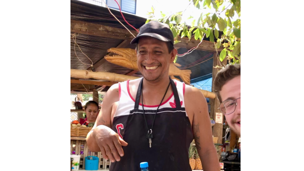 pepe from pepes fish tacos in puerto escondido smiling with apron on