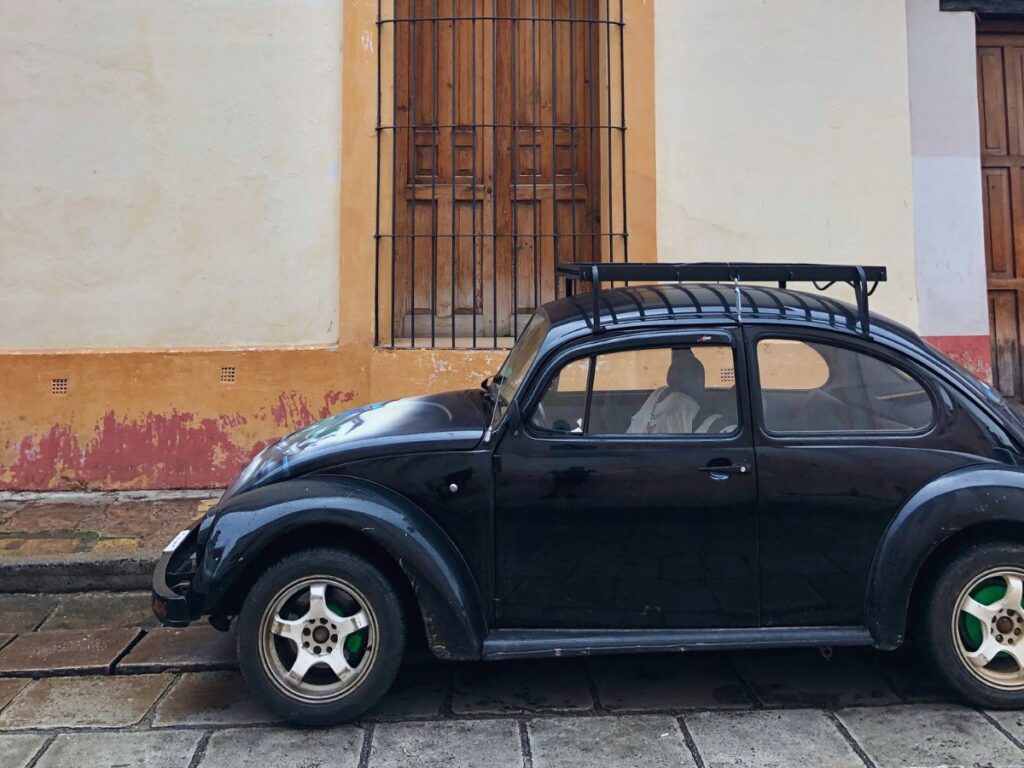 car in street of san cristobal de las casas