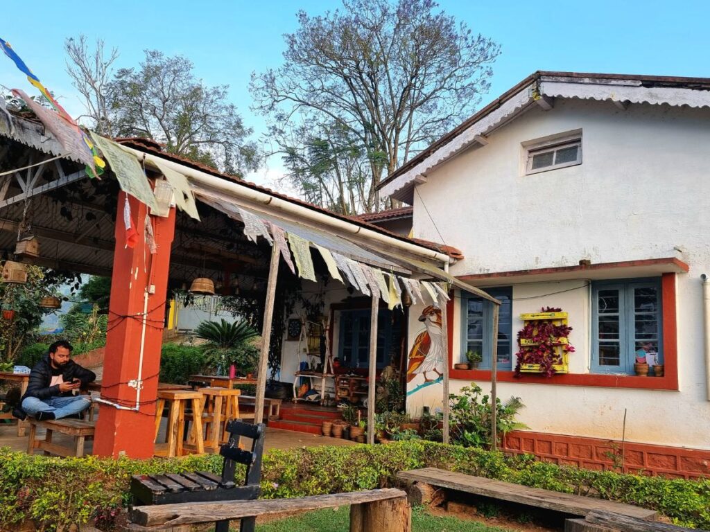 garden of the Birdhouse Hostel, best place to stay for backpackers in Coonoor