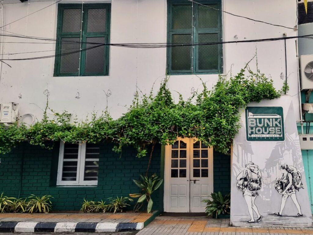 in front of the Bunkhouse Hostel (perfect for budget travellers) in Fort Kochi, Kerala
