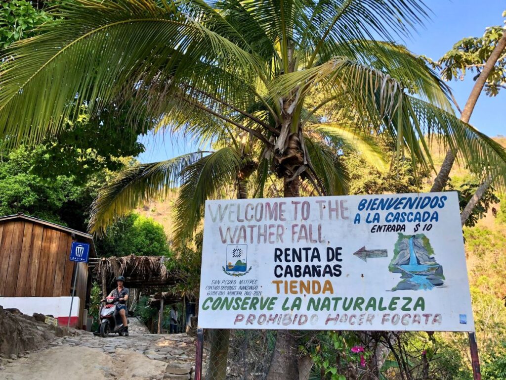 entrance sign to cascada la reforma waterfall, the best Puerto Escondido day trip