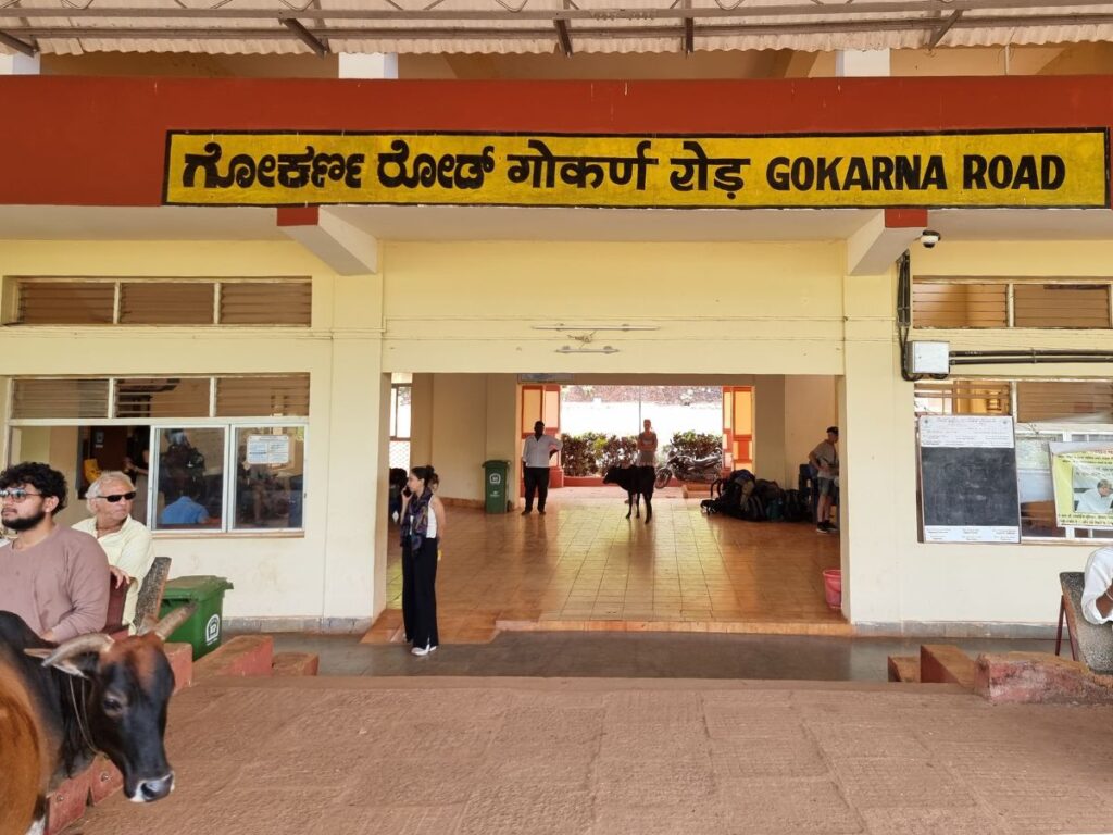 Inside Gokarna Road Railway station, people waiting for train