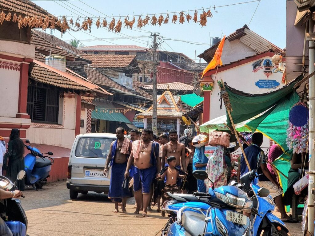 pilgrims walking next to Mahabaleshwar Temple in Gokarna town