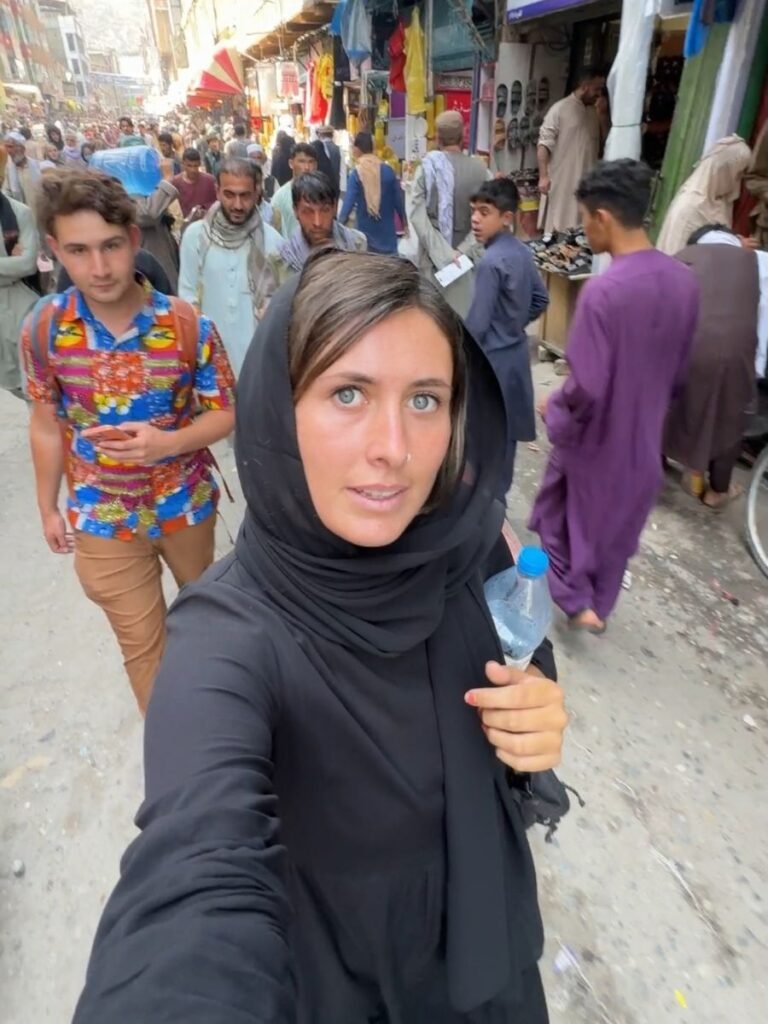 British female traveller walking in streets of Kabul, Afghanistan