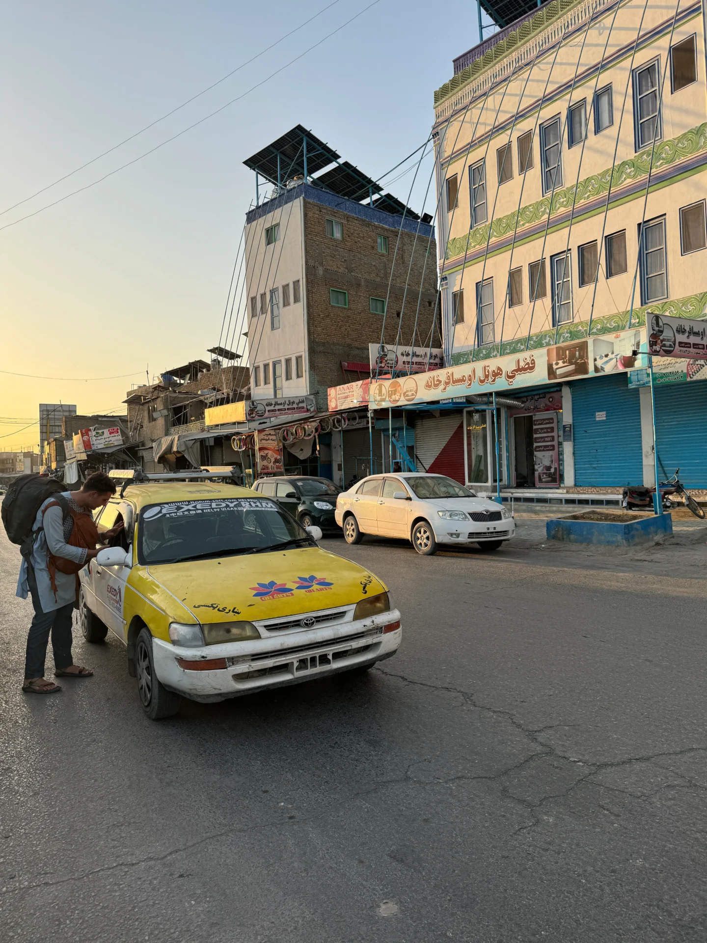 Tourist hailing a taxi in Afghanistan