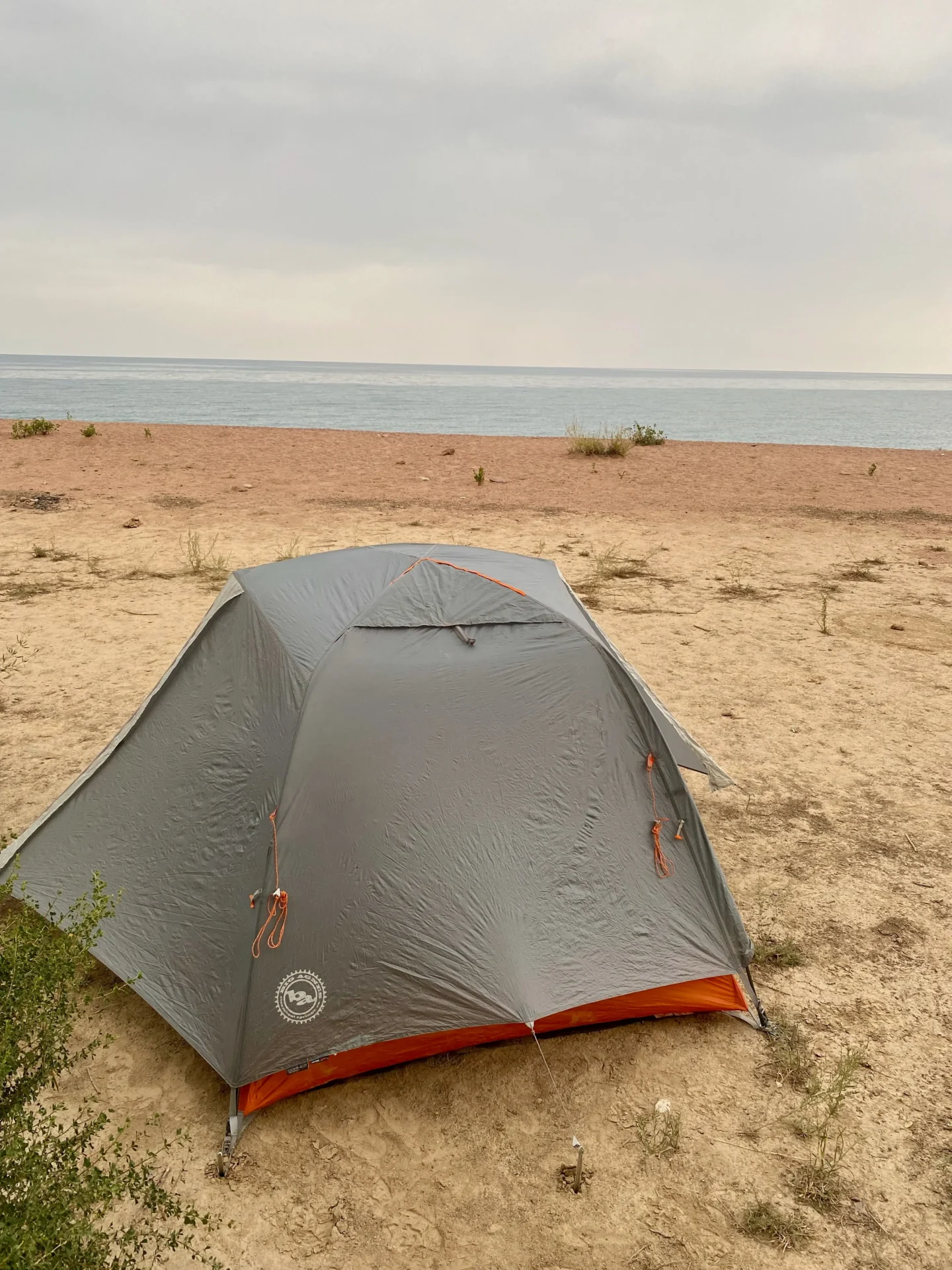 Camping on the beach next to fairytale canyon, lake issyk kul
