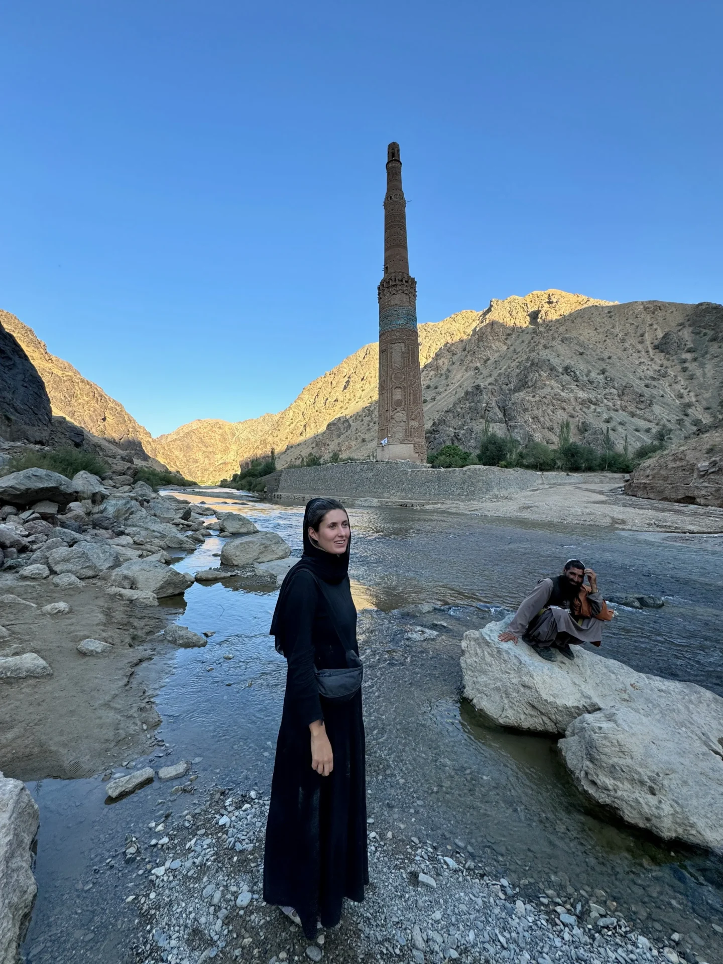 Jules from real talk travel standing in front of Minaret of Jam, Afghanistan